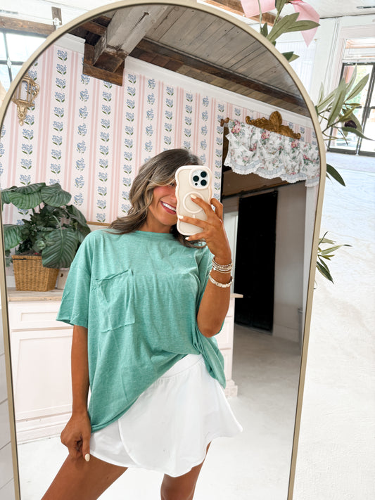 green pocket tee